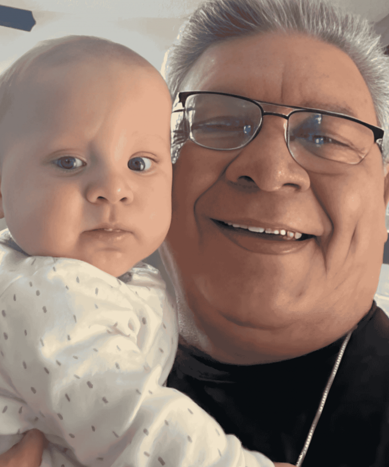 Roberto Henderson and grandchild